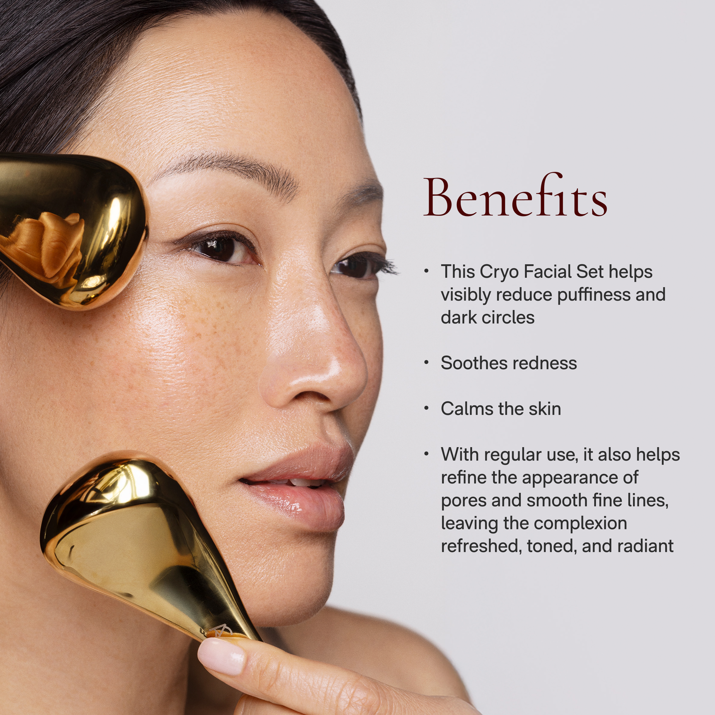 Asian model holding 2 freeze tools each hand with benefits listed in copy.
