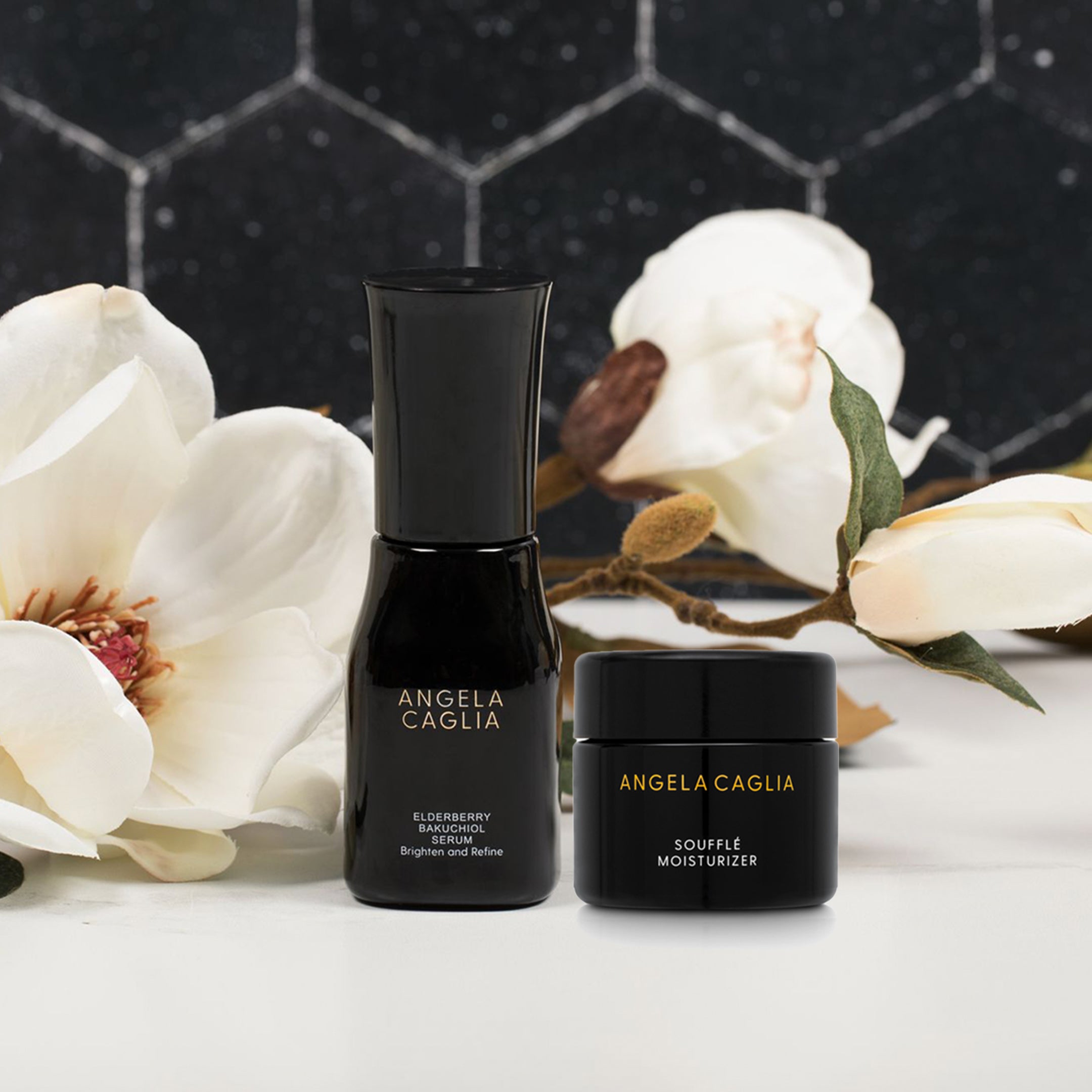 Elderberry Bakuchiol Serum with Souffle Moisturizer black tile background.